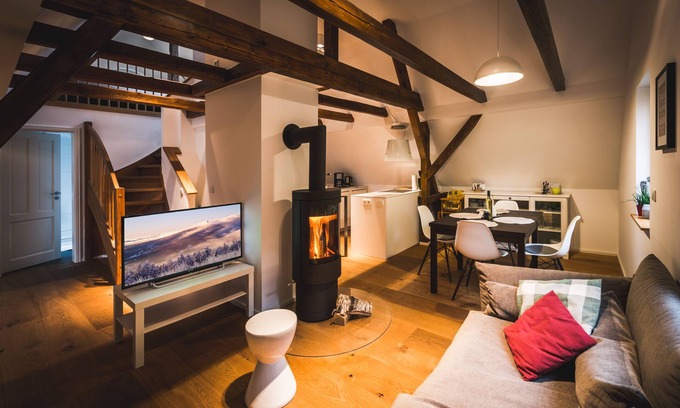 Baerenburg Apartment | Maisonette apartment on the top floor with fireplace on the edge of the forest
