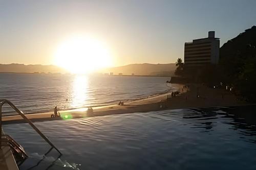 Prainha Apartment | Maravilhoso Apto Beira-Mar Prainha, Caraguatatuba com Piscina e Sauna