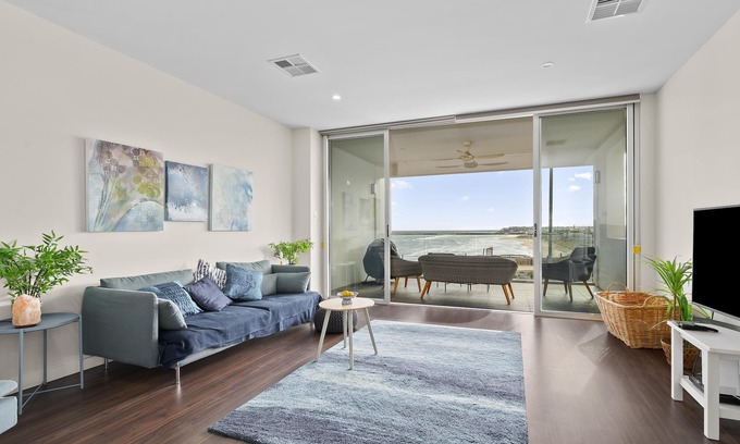 Aldinga Beach House | Meander ~ Port Noarlunga South - Perched up high on the red sandstone beach cliffs, your vantage point offers unrivalled views of where the Onkaparinga River meets the sea – just outside your front door.