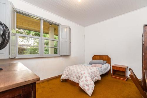 Bacacheri House | Memora Guesthouse Curitiba - Quartos em Casa próximo ao Parque Bacacheri