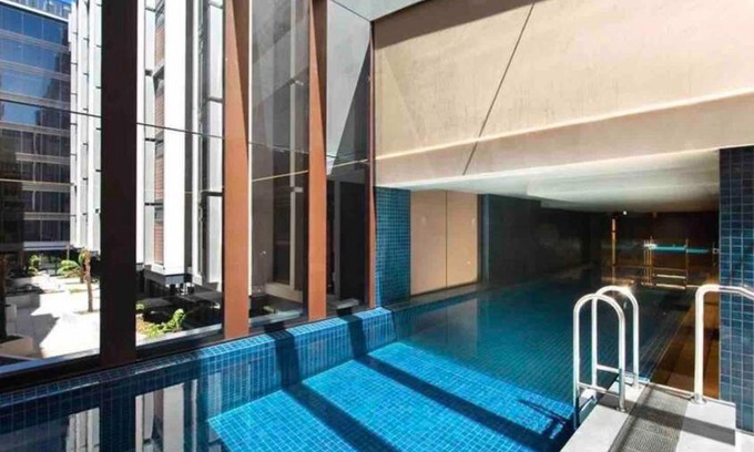 Braddon Apartment | Midnight Luxe 1BR Apartment in the heart of Braddon Views from L7 Pool Sauna Gym Secure Parking Wifi Wine