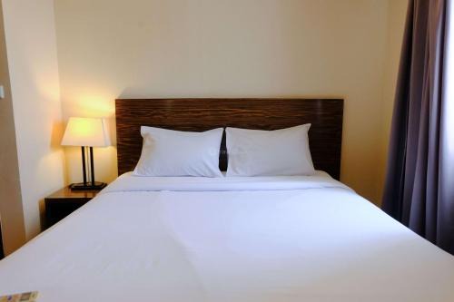 Braga Apartment | Modern Look 3BR at Apartment Braga City Walk By Travelio