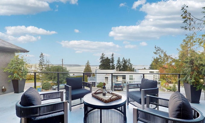 Mukilteo House | Modern retreat with panoramic ocean views, chef’s kitchen, and gas fireplace