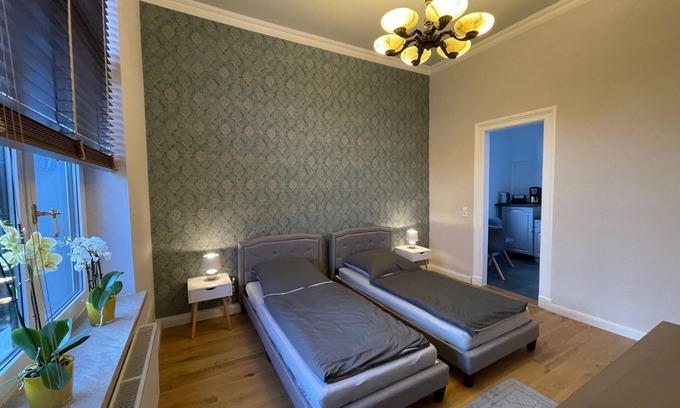 Schmolln Apartment | Moritz townhouse-modern apartment in the style of the old + garden shed
