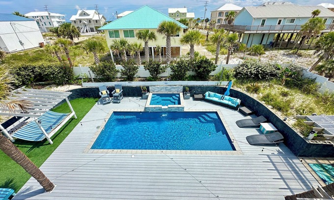 Navarre Beach House | Most Private Oasis On The Island-Heated Pool, Huge Backyard,Grilling,TV,Firepit.
