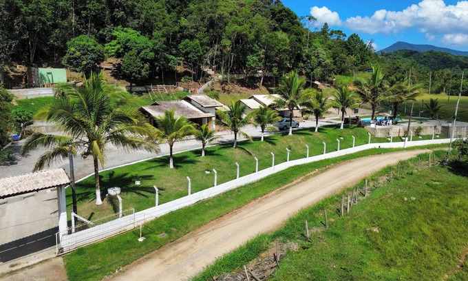 Camboriu House | Natural Refuge in Balneário Camboriú: Beach, Beach Tennis and Pool in Harmony