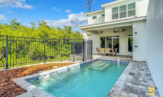 New Smyrna Beach House | New duplex, pool, dock, 2 blocks from Flagler