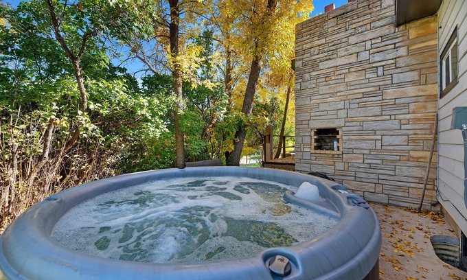 Spearfish House | NEW LISTING! Charming Retreat w/ Hot Tub, Pizza Oven by RedAwning