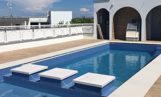 Duna Verde Apartment | New modern apartment with private roof terrace, big garden, sandy beach 400 mt.