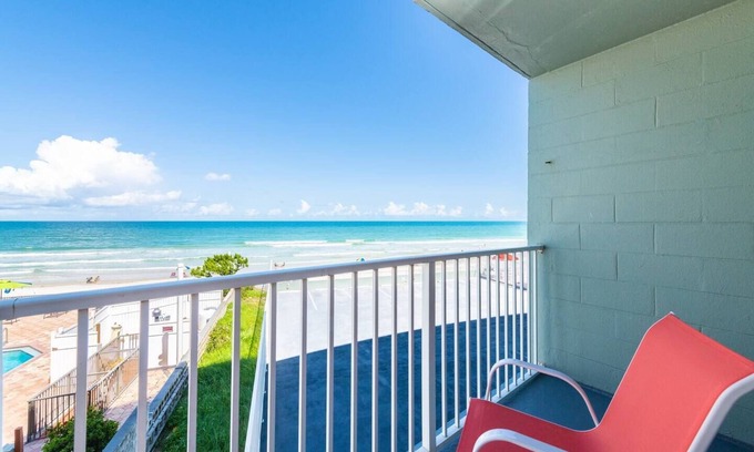East Daytona Apartment | NEW POOL OPEN! Direct Oceanfront | Remodeled Tiki Theme | Private Balcony