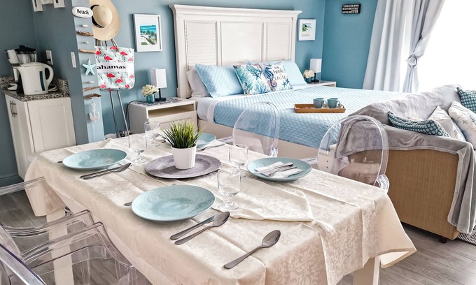 Williams Town Condo | NEW Stunning Ground Floor Beachfront Studio in Coral Beach, Grand Bahamas