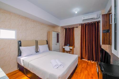 Lenteng Agung Apartment | Nice and Cozy Studio at La Hub City Apartment By Travelio