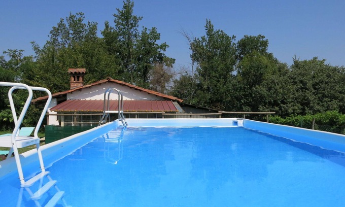 San Damiano dʼAsti Villa | Nice apartment in villa for 6 guests with WIFI, pool, TV, patio and pets allowed