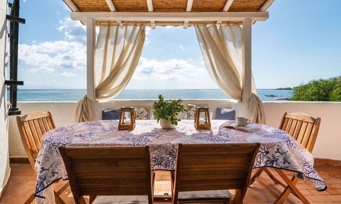 Province of Cagliari Villa | Nice apartment in villa for 8 guests with A/C, WIFI, TV, patio and parking