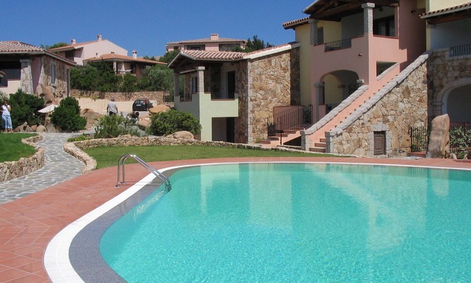 Monte Petrosu Apartment | Nice apartment with roof terrace in an elegant complex with swimming pool