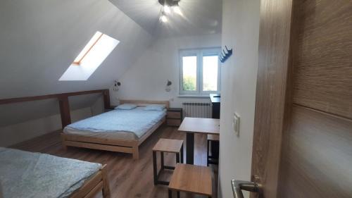 Karwie House | Noclegi u Adama