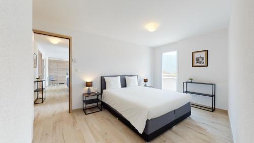Aigle Apartment | Nonanteneuf appart hōtel Aigle - contactless check-in