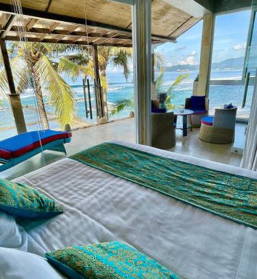 Candi Dasa Apartment | Ocean Suite By A&J - Exceptional Beachfront Apartment - Candidasa