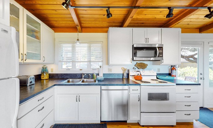 Manzanita House | Oceanfront home with EV charger, enclosed yard, beach access and views