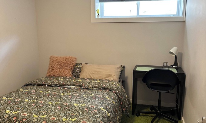 Southwest Edmonton House | One bedroom basement, shared suite with basic amenities for a comfortable stay.