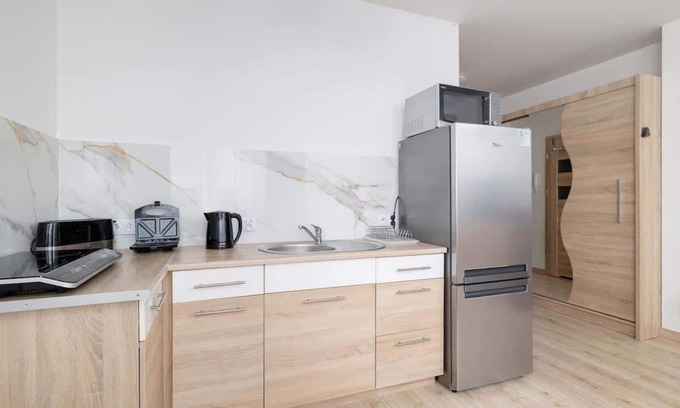 Wieliczka Apartment | Os Szymanowskiego 18 Trendy Apartment Parking