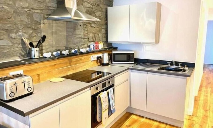New Quay House | Our cosy 2-bedroom apartment is just steps away from New Quay beaches