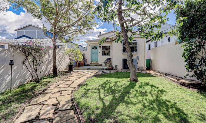 Tree Section House | Palm Haven: A Tranquil Beach Community Escape