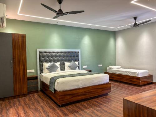 Indiranagar Hotel | Palm Mystic Inn - Indiranagar