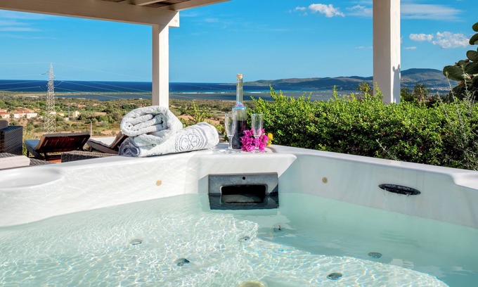 San Teodoro Apartment | Panoramic Holiday Apartment "Isuledda" with Sea View, Shared Pool & Air Conditioning