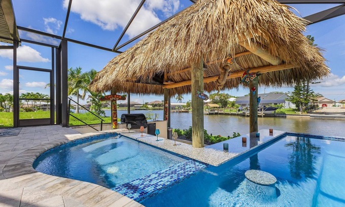 Burnt Store House | Paradise Tiki: Gulf Access, Tiki Bar, Pool & Spa! Spacious 5 bedroom home!