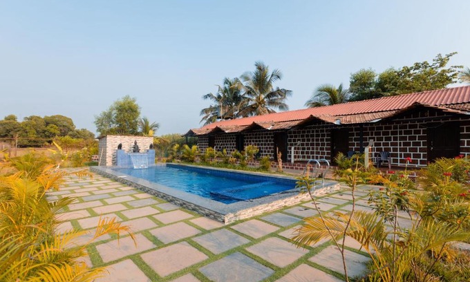 Nagoa House | Peacock Retreat 5BR Cottages with Private Pool & Scenic Views Saligao