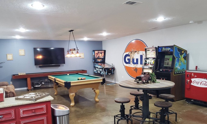 Bryan House | Pinball, pool table, slot machine, shuffleboard, adult drink machines, 65" TV