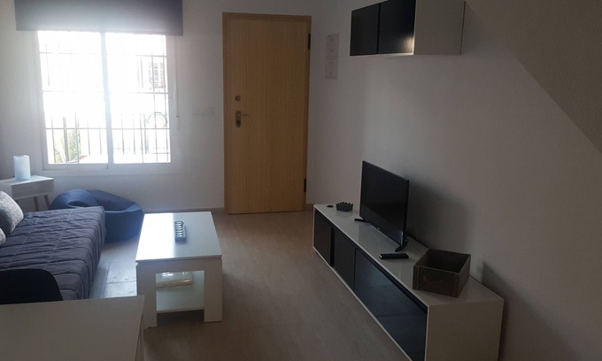 San Juan de los Terreros House | Pink house with pool