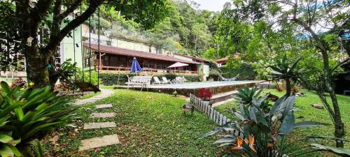 Quitandinha House | Pousadinha Lá em Casa