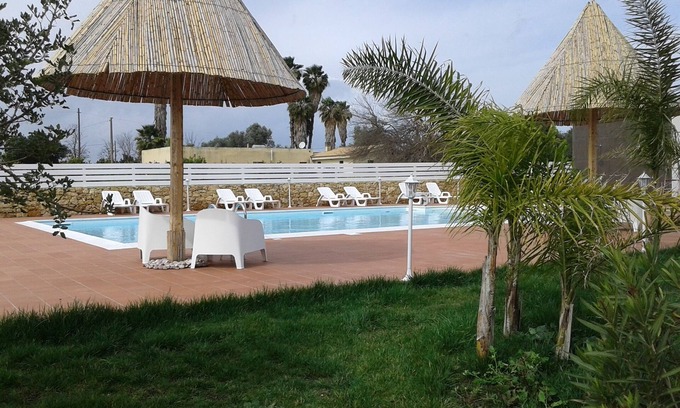 Fanusa Villa | prestigious villa with swimming pool surrounded by greenery near the sea