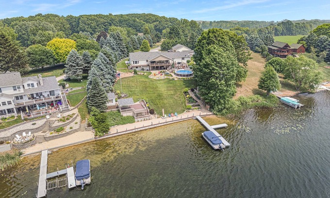 Vestaburg Cottage | Private lakefront home. Sandy beach canoe, 2 kayaks. Pool, Spa & Pontoon rental.