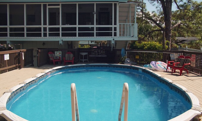 Alligator Point House | Private pool, boat dock & screened porches - 1.5 blocks to public beach access.