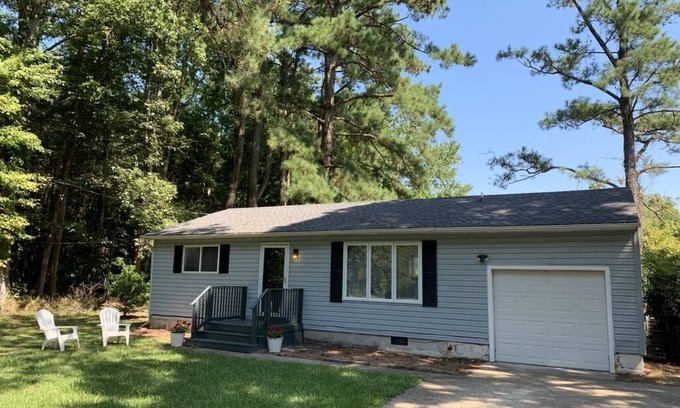 Fentress House | Private single family home with a natural wooded setting providing much privacy.