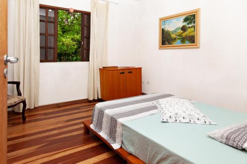 Pilarzinho House | quarto Refúgio no Bosque