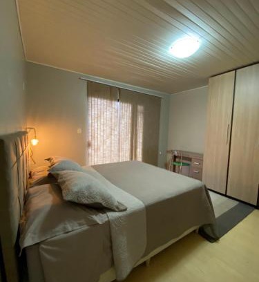 Xaxim House | Quarto suíte privativa