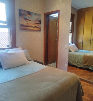 Savassi House | Quarto Suite -Em apartamento familiar