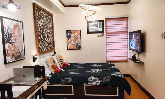 Muntinlupa Apartment | Queen Bed Deluxe- Contemporary Style