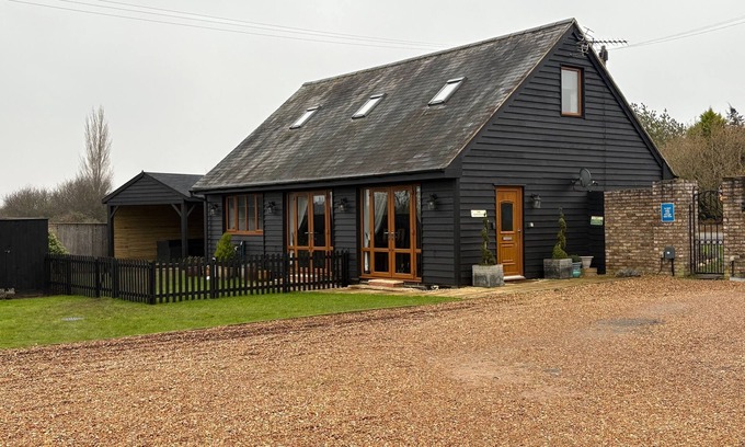 Wisbech House | Quiet setting with secure gated parking, children's play area & farm animals