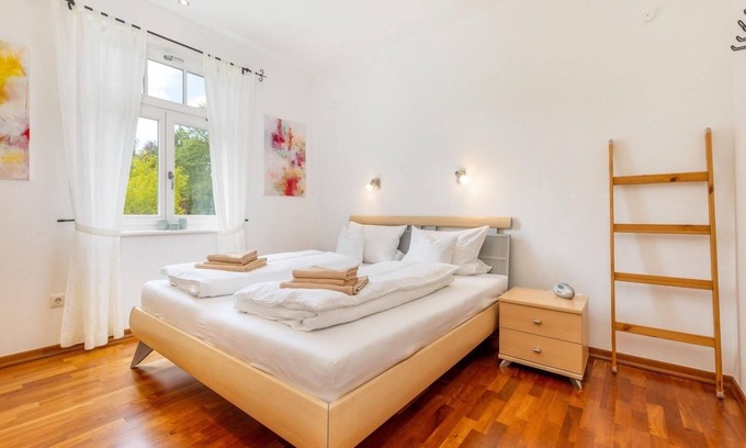 Zudar Apartment | Rügenbrise am Wasser - Fewo EG