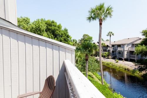 Twin Oaks House | Racquet Club 10 by Wild Dunes, in Resort Core