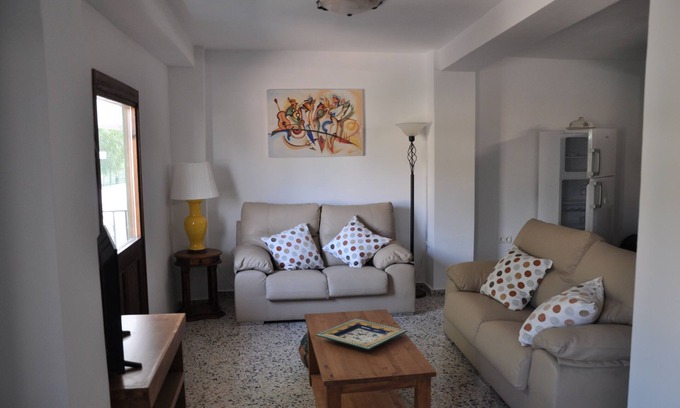 Orgiva House | Recently renovated 2 bed townhouse with a large roof terrace in Orgiva town.