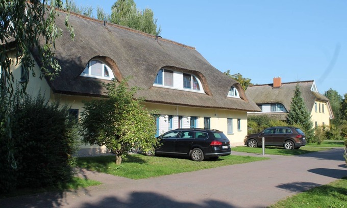 Puddemin House | Reetdachhaus Holunder 1 - Ferienhaus Holunder 1 im Feriendorf Puddemin