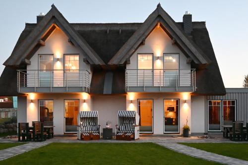 Glowe Apartment | Reethaus "Meeresrauschen" für 4 Personen Käpt'n Jan Glowe