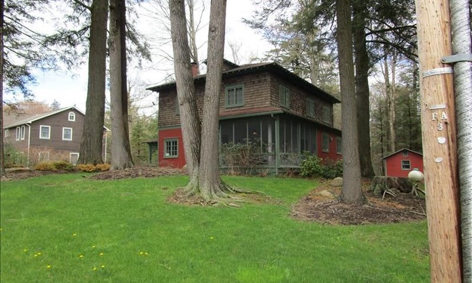 Eagles Mere Cottage | Relax in the shade after a day in the sun at the delightful "Tall Trees' Cottage in Eagles Mere.