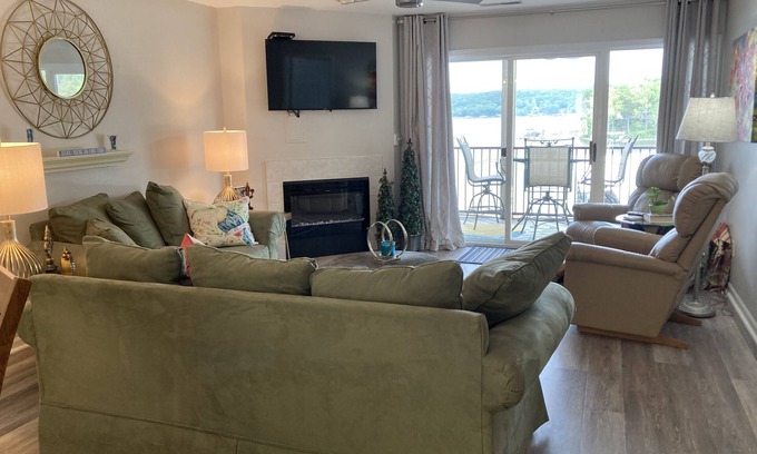Camdenton Condo | Relax on your screened in balcony overlooking the Lake. Two Golf Courses nearby.